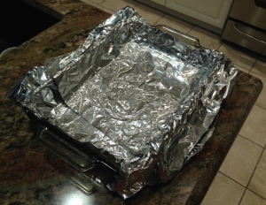 Line the pan with foil and let it overlap the sides to create handles...